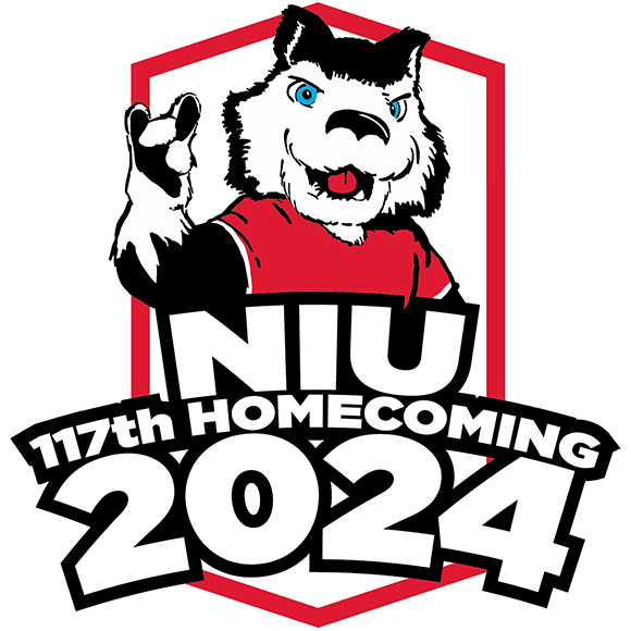 Victor E Huskie coming out of the NIU Shield logo. NIU 117th Homecoming 2024