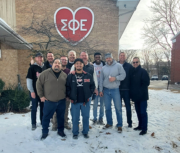 Photo of the brothers and alumni of Sigma Phi Epsilon, at their new chapter home
