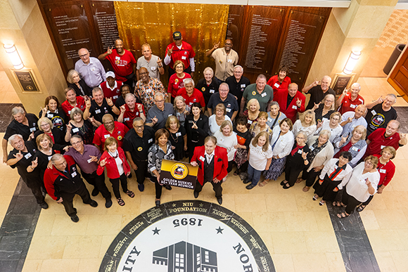 Golden Huskie Alumni Network group photo taken at the 2025 reunion reception at the Barsema Alumni and Visitors Center.