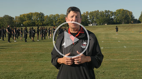 2025 Huskies Invest Band Video Screen Grab with play button featuring Dr. Bough