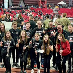 Alumni members of the Pep Band at Cram the Convo