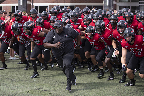 Coach Hammock charging the field